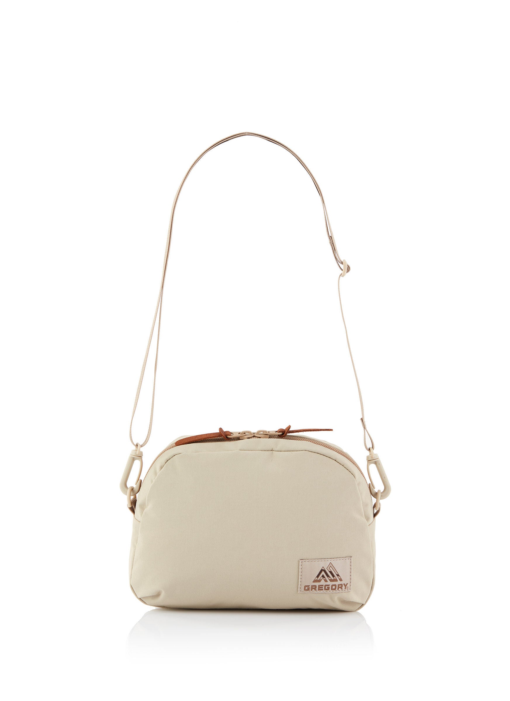 クロスボディバッグM サンド | グレゴリー公式オンラインストア